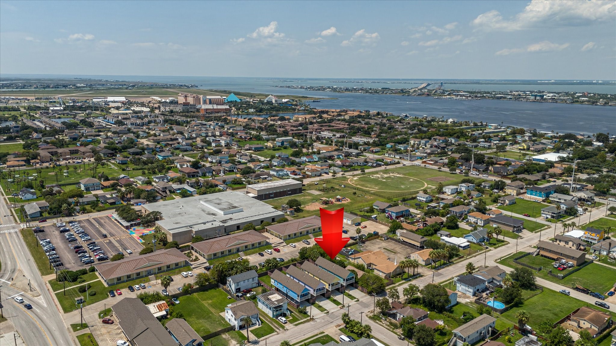 2301 67th Street Galveston, TX 77551 - Photo 5 of 46 an aerial view of a city