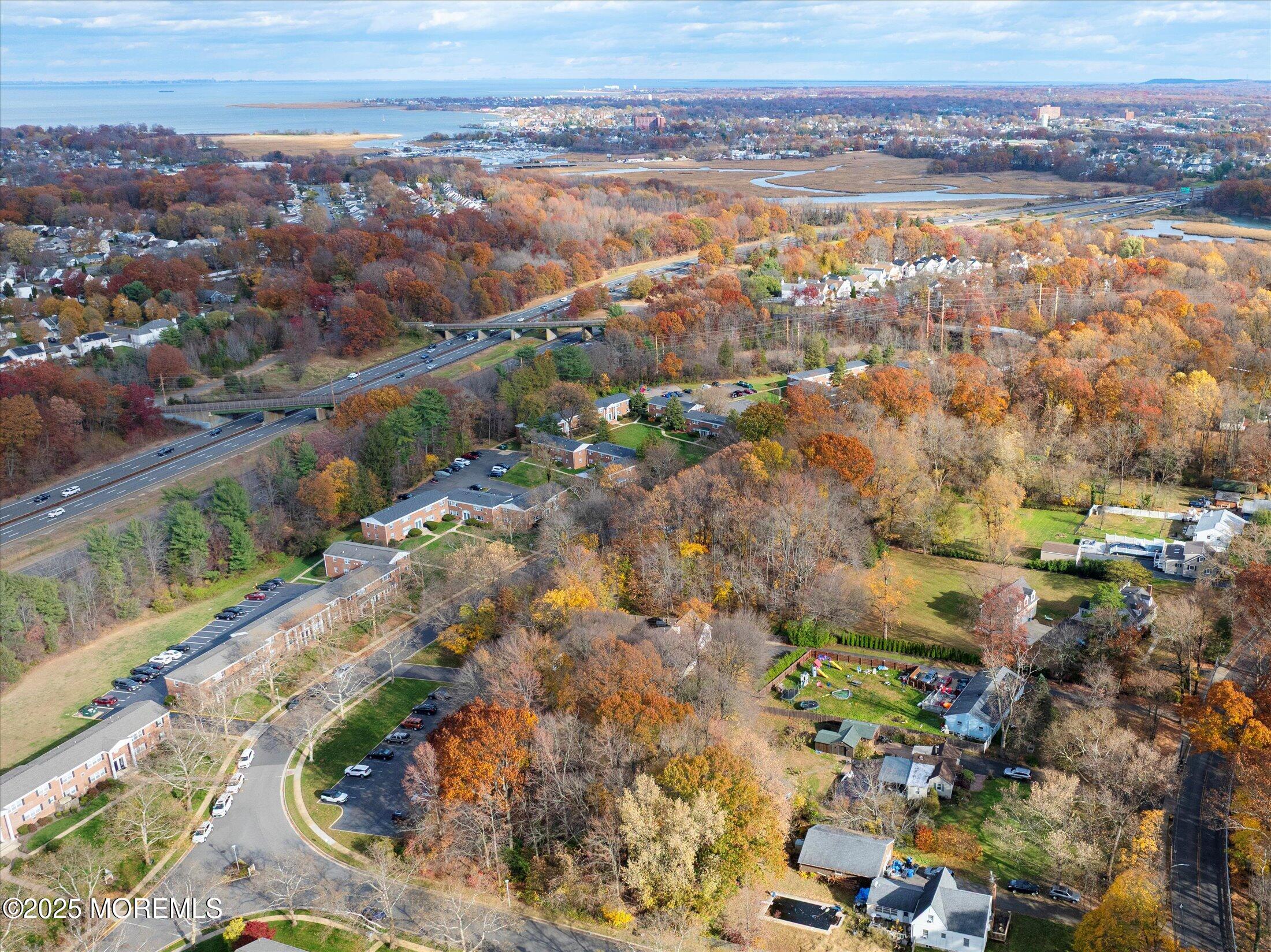 4 Sutton Place Matawan, NJ 07747 - Photo 11 of 12 an aerial view of residential houses with outdoor space