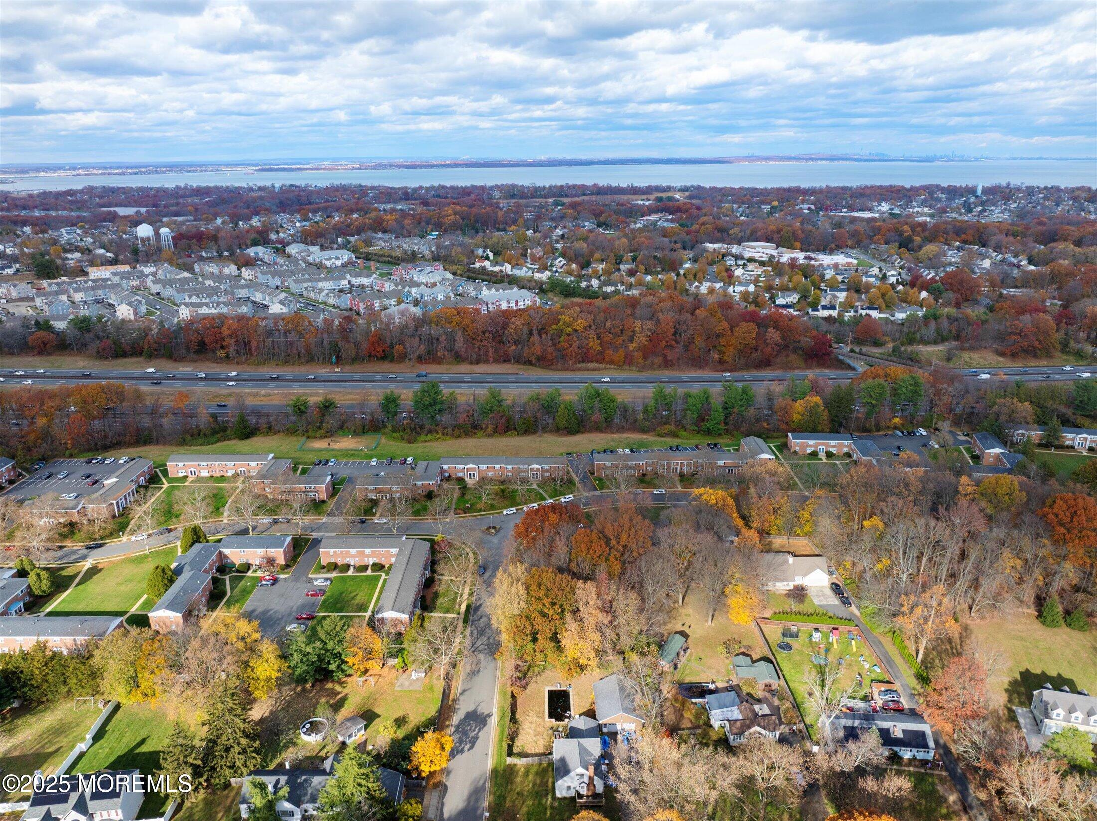 4 Sutton Place Matawan, NJ 07747 - Photo 12 of 12 an aerial view of residential building and lake