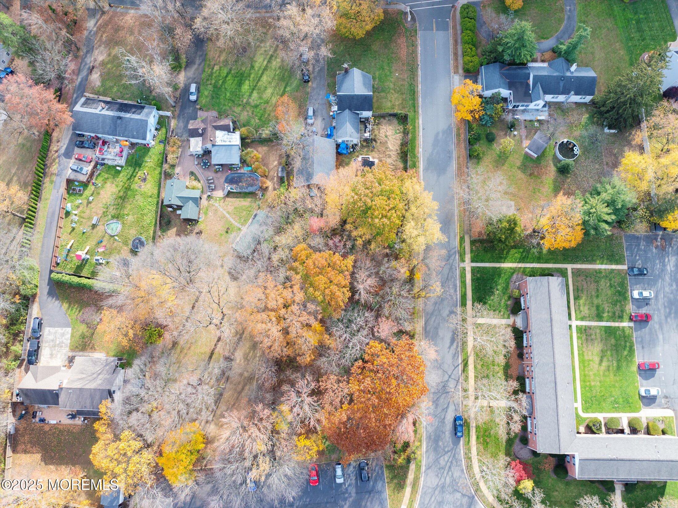 4 Sutton Place Matawan, NJ 07747 - Photo 4 of 12 a picture of houses with outdoor space