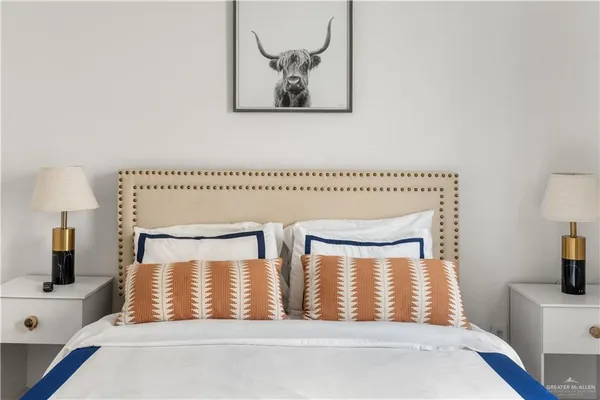 a kitchen with kitchen island a counter appliances and cabinets