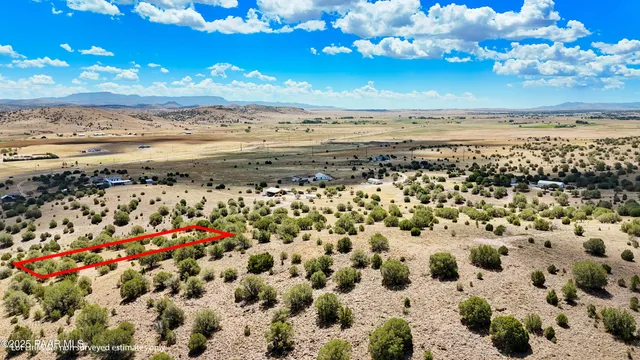 a view of a backyard of a house