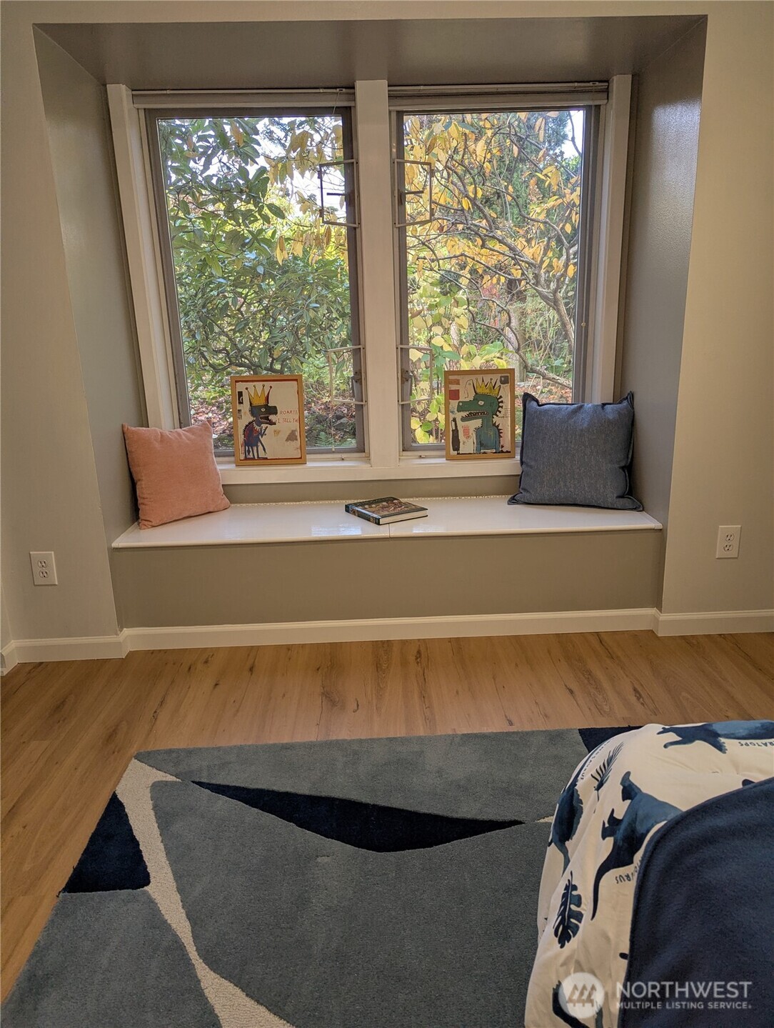 2650 West Newton Street Seattle, WA 98199 - Photo 17 of 25 a living room with a bed and a large window