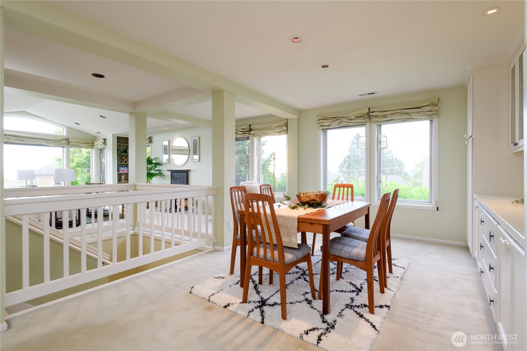 2650 West Newton Street Seattle, WA 98199 - Photo 9 of 25 a view of a dining room with furniture window and wooden floor