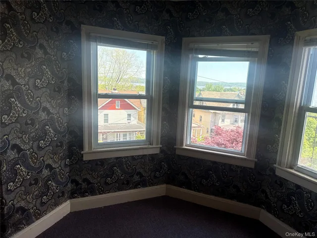 a view of swimming pool from a window