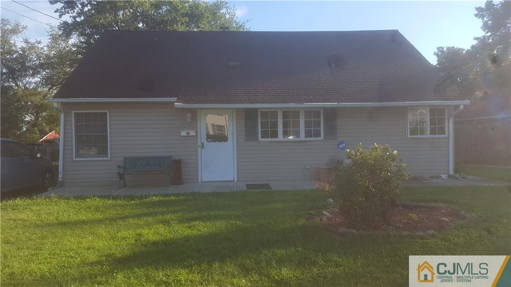 20 Caldwell Road Edison, NJ 08817 - Photo 1 of 2 front view of house with a yard