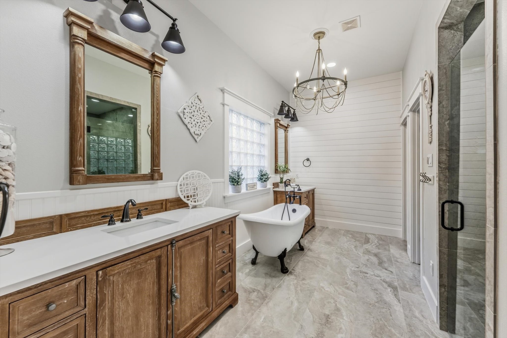 103 Fox Rindle Road Montgomery, TX 77316 - Photo 16 of 44 The dreamy clawfoot soaking tub serves as the showpiece of the bath, delivering spa inspired elegance and timeless charm.