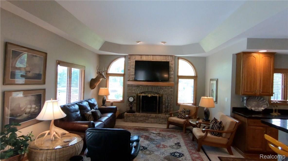 2829 Six Mile Road South Lyon, MI 48178 - Photo 24 of 46 Enjoy family time in great room right off kitchen.
