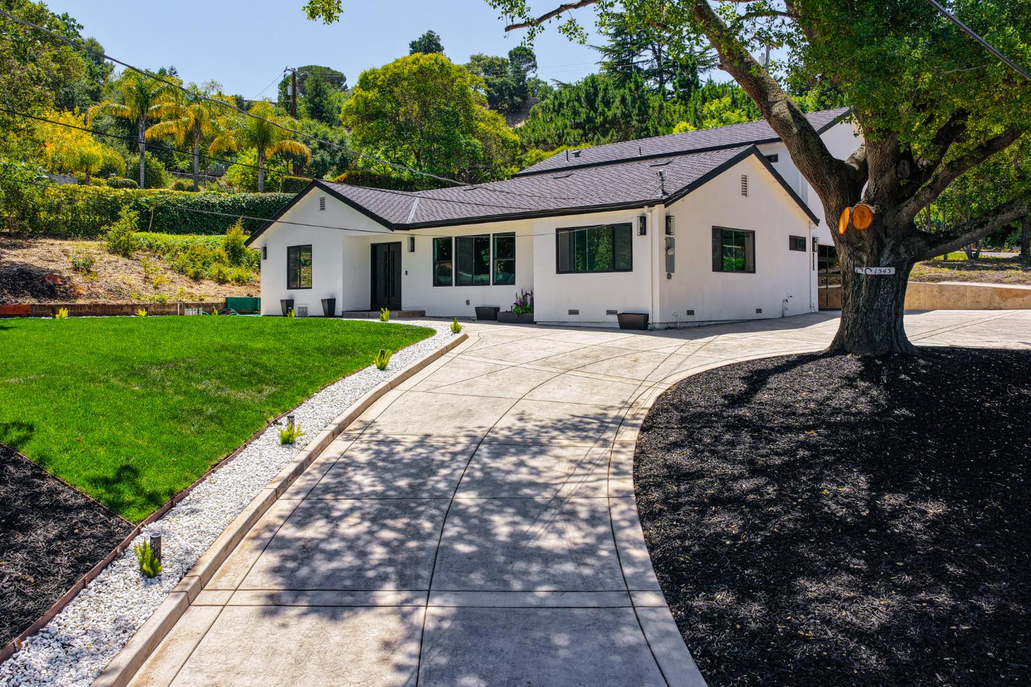 1543 Rancho View Drive Lafayette, CA 94549 - Photo 71 of 86 a front view of a house with a yard