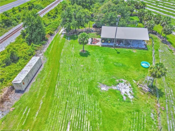 a backyard of a house with lots of green space