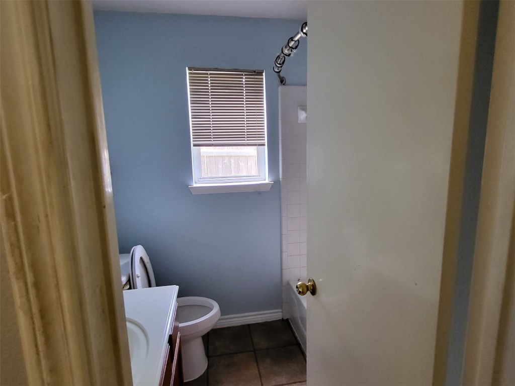 512 Maplecreek Drive Leander, TX 78641 - Photo 11 of 13 a white toilet sitting next to a window