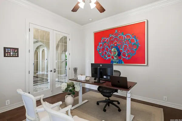 a room with furniture lamps and a chandelier