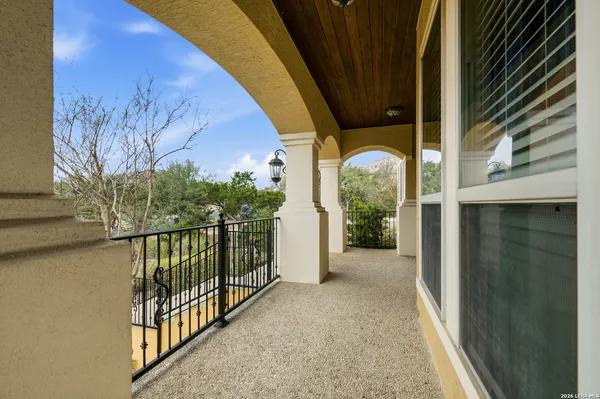 a view of a balcony with an outdoor space