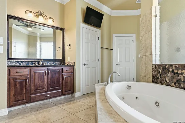 a bathroom with a bathtub and a sink