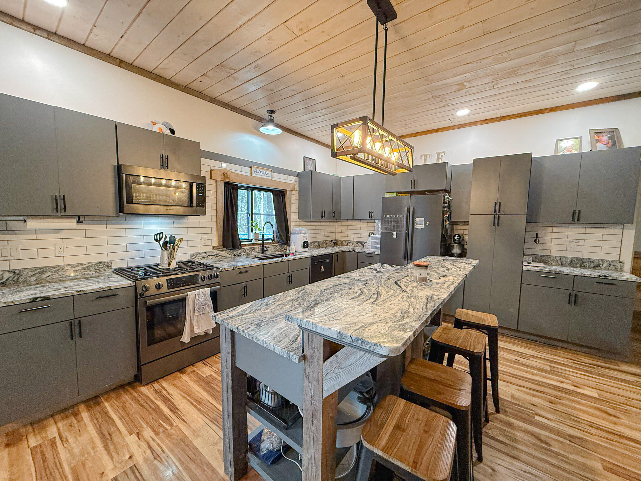 961-967 Newbury Neck Road Surry, ME 04684 - Photo 22 of 59 large kitchen with island
