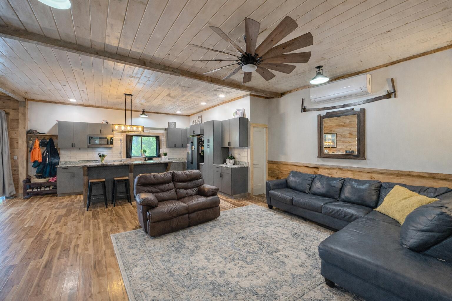 961-967 Newbury Neck Road Surry, ME 04684 - Photo 24 of 59 Living room looking into kitchen