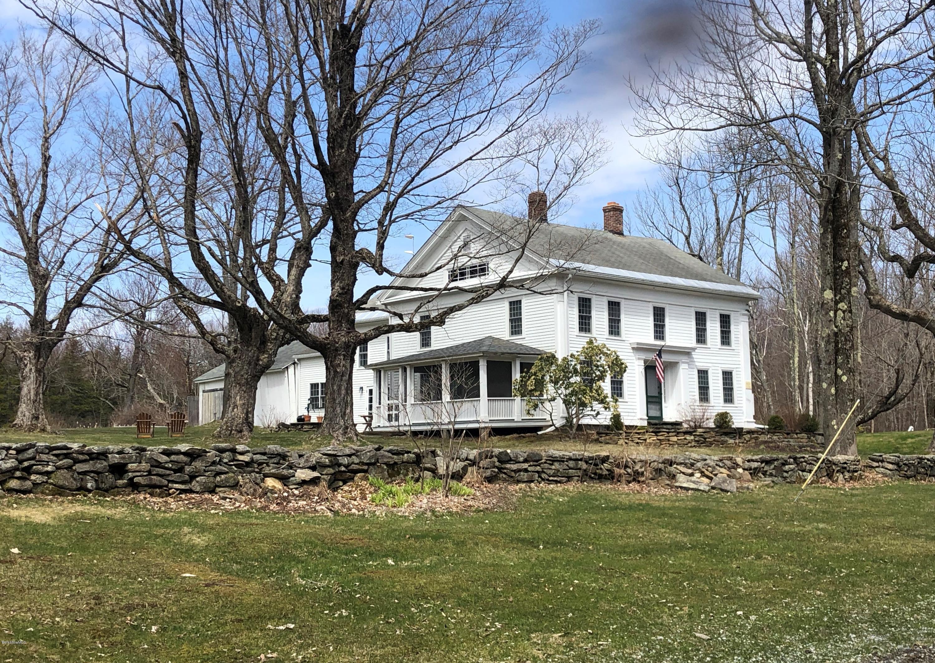 1377 Fred Snow Road Becket, MA 01223 - Photo 1 of 34 a front view of a house with a yard