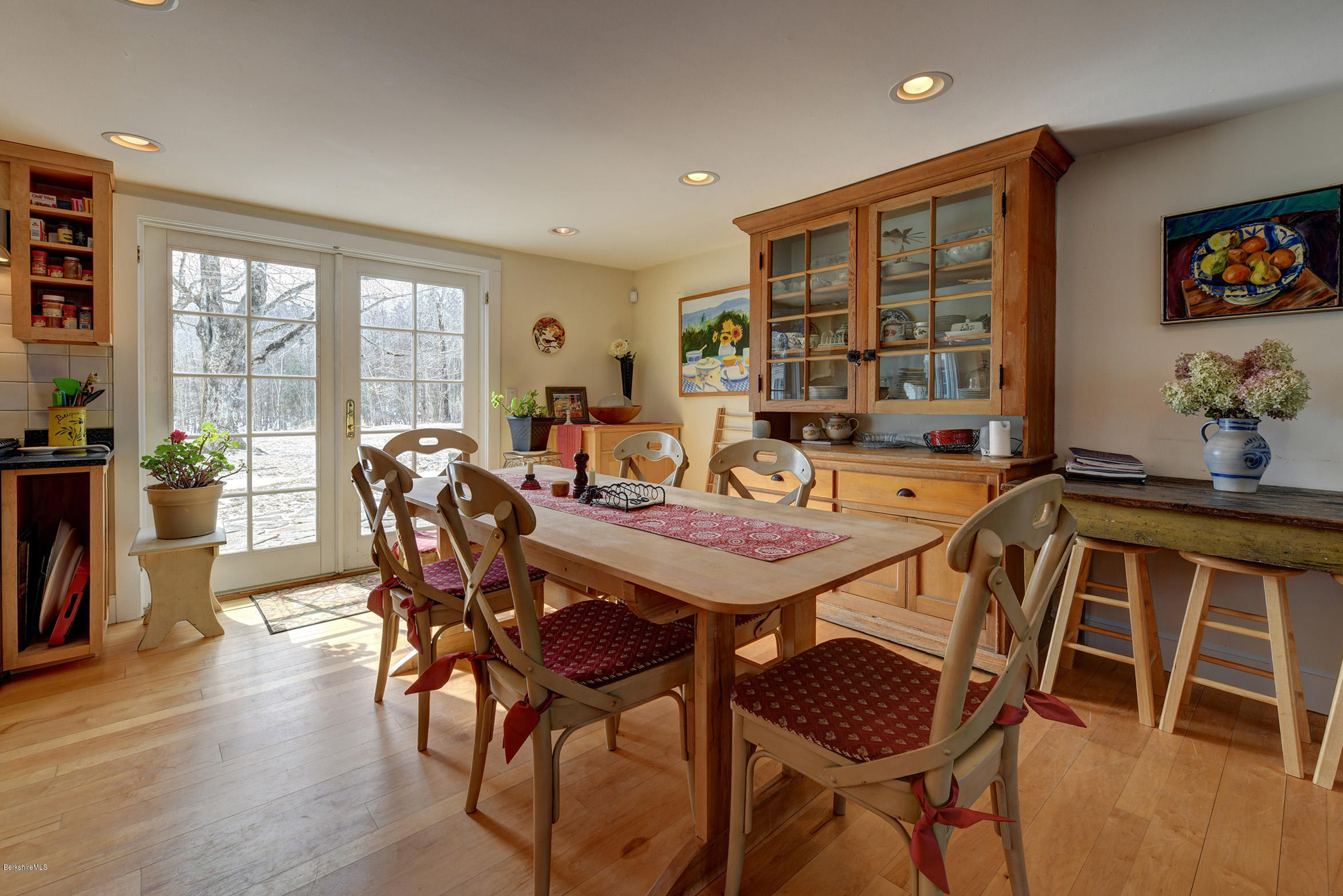 1377 Fred Snow Road Becket, MA 01223 - Photo 12 of 34 a view of a dining room with furniture window and wooden floor