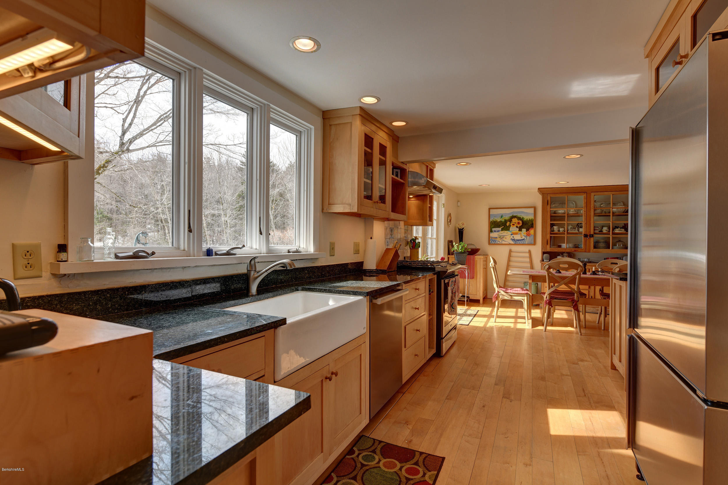 1377 Fred Snow Road Becket, MA 01223 - Photo 13 of 34 a view of a kitchen with kitchen island granite countertop a large window
