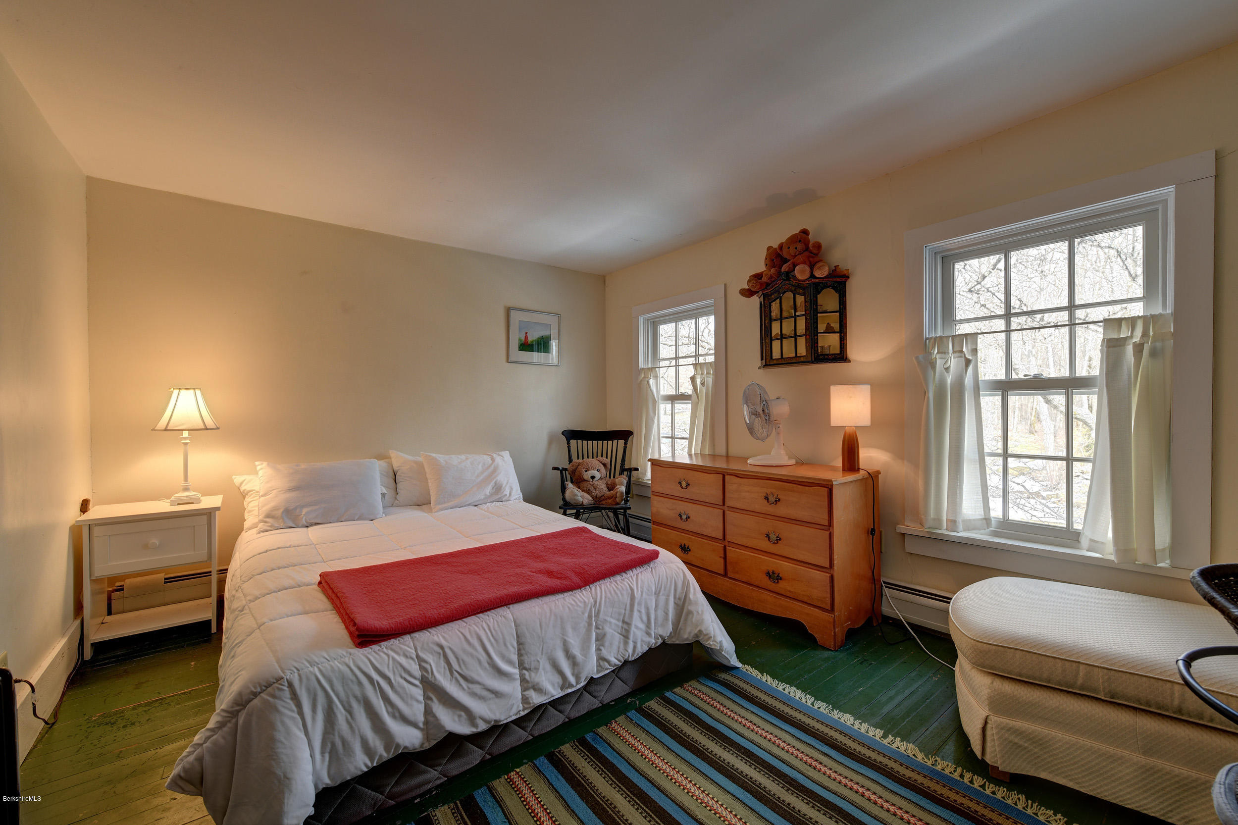 1377 Fred Snow Road Becket, MA 01223 - Photo 30 of 34 a bedroom with a bed and a couch