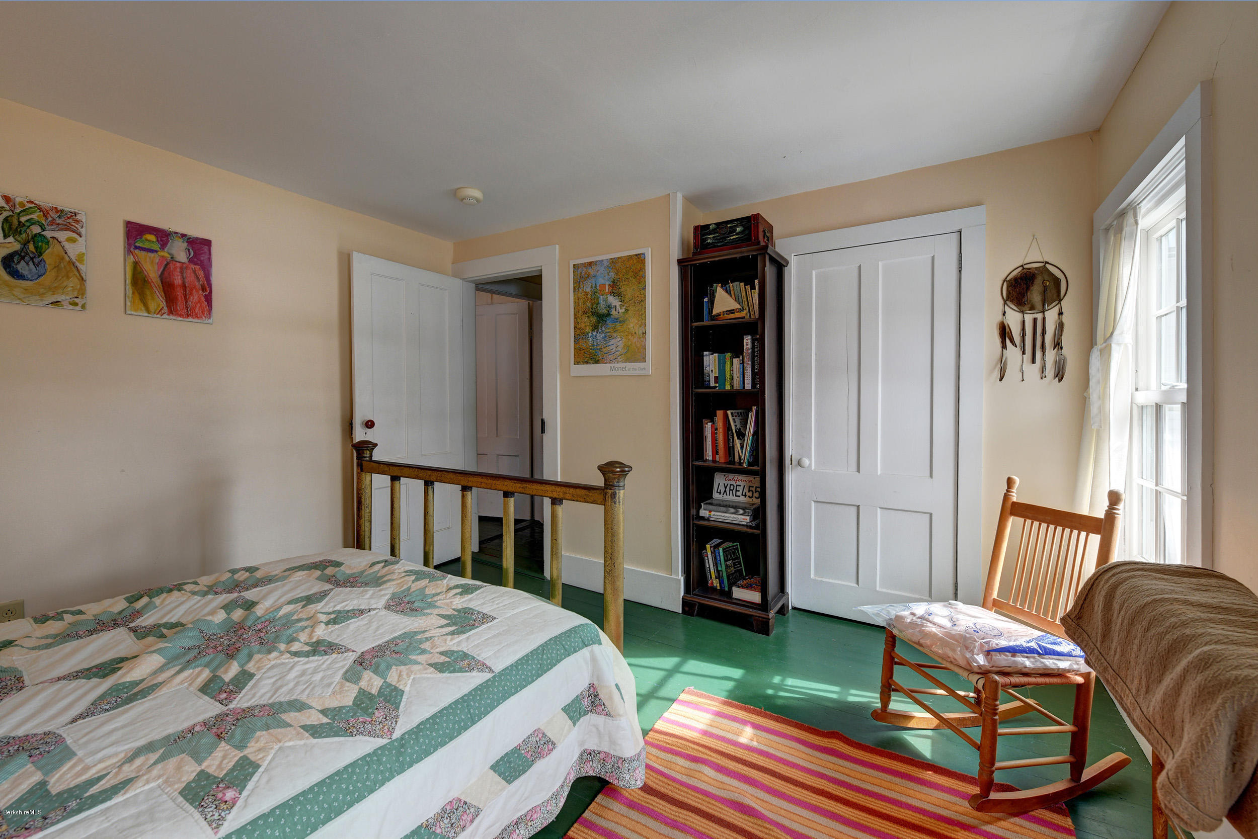 1377 Fred Snow Road Becket, MA 01223 - Photo 33 of 34 a bedroom with furniture and a rug