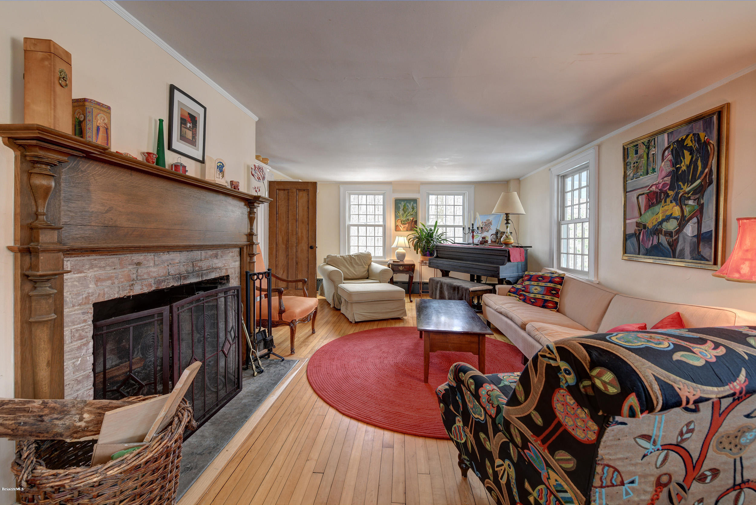 1377 Fred Snow Road Becket, MA 01223 - Photo 5 of 34 a view of a livingroom with furniture and a fireplace