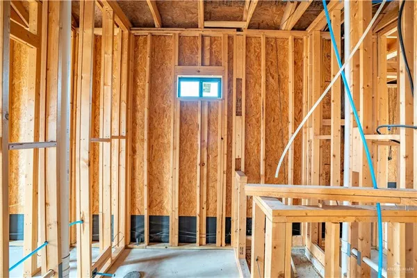 a view of an empty room with a sliding door