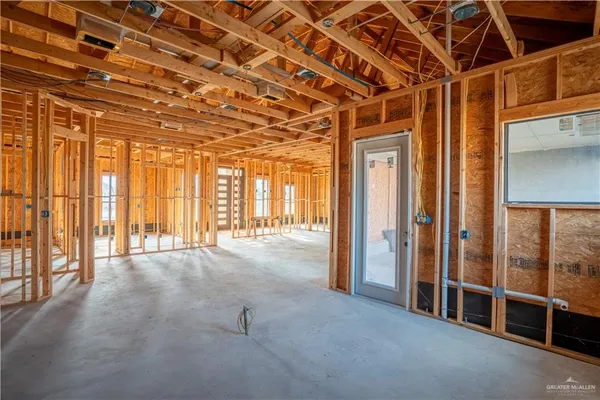 a view of a porch with a floor to ceiling window