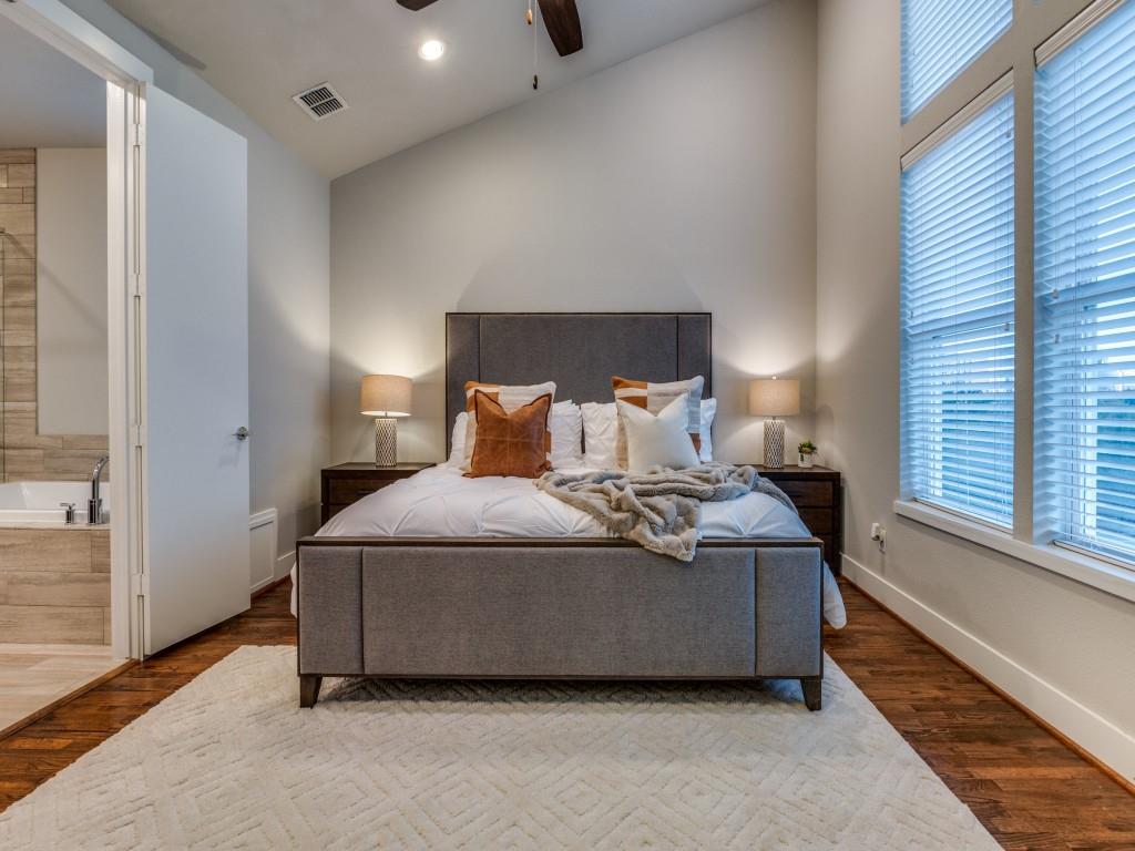 4211 Rawlins Street, Unit 97 Dallas, TX 75219 - Photo 13 of 24 a bedroom with a bed and window