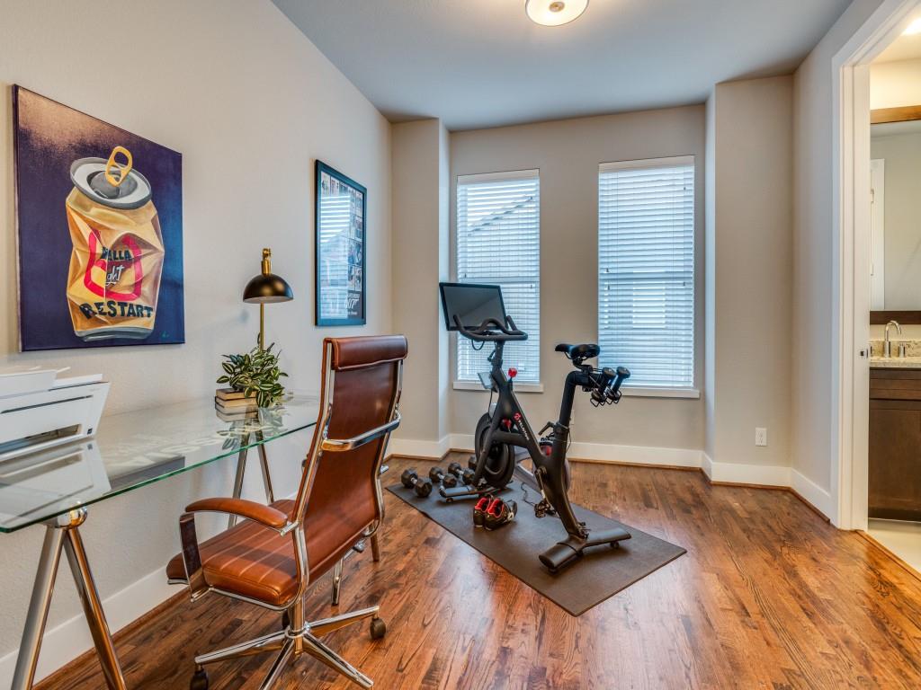 4211 Rawlins Street, Unit 97 Dallas, TX 75219 - Photo 21 of 24 a view of a workspace with furniture and a window