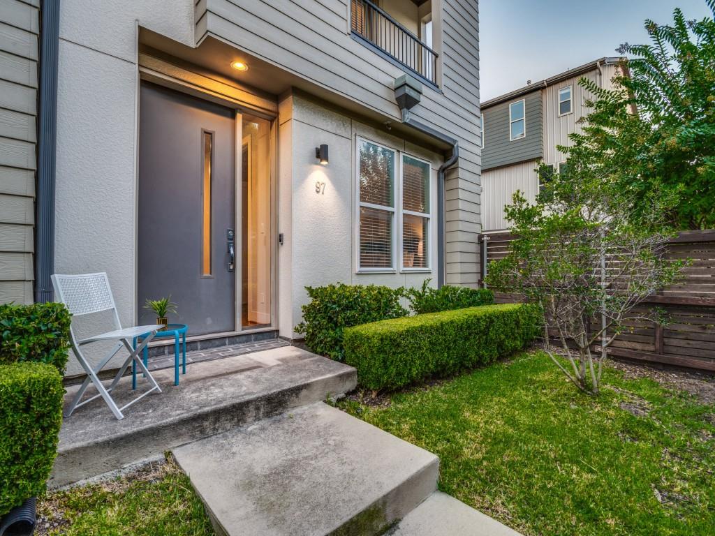 4211 Rawlins Street, Unit 97 Dallas, TX 75219 - Photo 10 of 24 a view of a house with a backyard