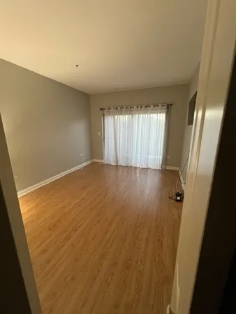 a bathroom with a bathtub sink vanity granite and shower