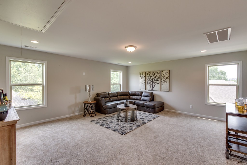 942 Hunters Lane Springfield, TN 37172 - Photo 13 of 40 a living room with furniture window and wooden floor