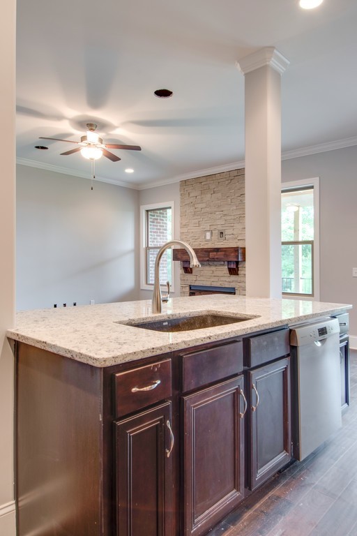 942 Hunters Lane Springfield, TN 37172 - Photo 19 of 40 a kitchen with a sink a counter space and cabinets