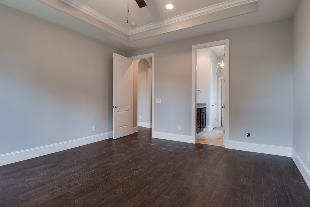 942 Hunters Lane Springfield, TN 37172 - Photo 22 of 40 a view of an empty room with wooden floor
