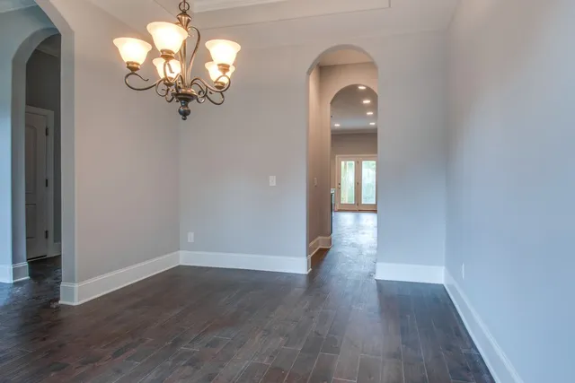a view of a livingroom with wooden floor
