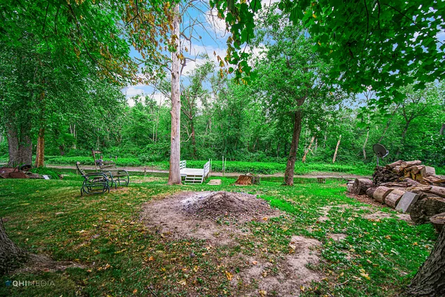 a view of a lake with a yard
