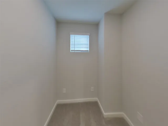 a view of a small space with a window