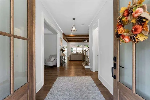 a view of a hallway view with living room