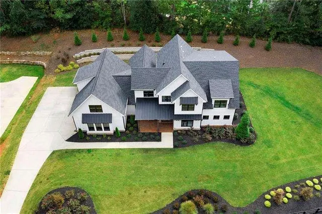 a view of a swimming pool with a garden