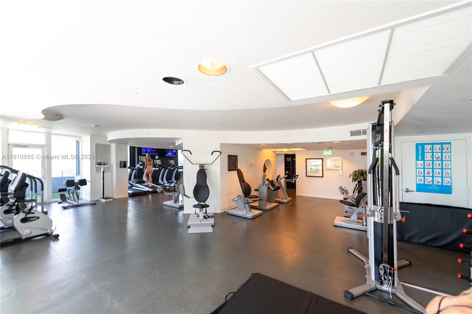 1330 West Avenue, Unit 3104 Miami Beach, FL 33139 - Photo 17 of 18 a view of a room with gym equipment