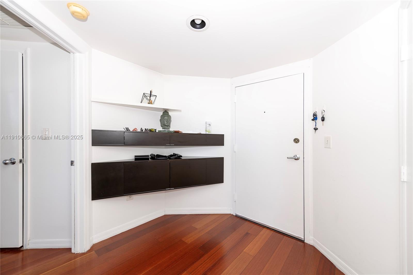 1330 West Avenue, Unit 3104 Miami Beach, FL 33139 - Photo 8 of 18 a bedroom with a bed and a dresser