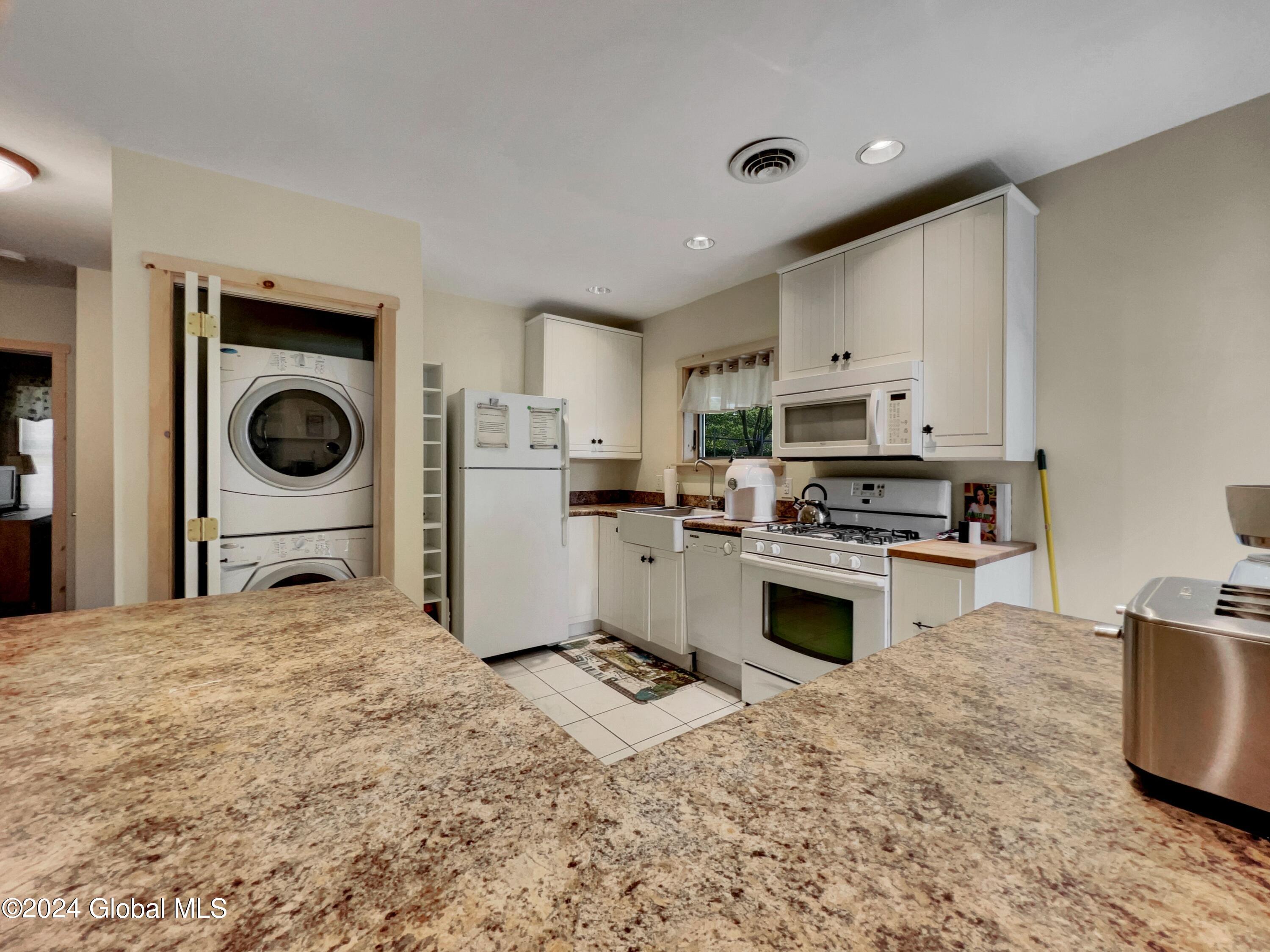 62 Reardon Road Queensbury, NY 12804 - Photo 10 of 26 Kitchen and Laundry