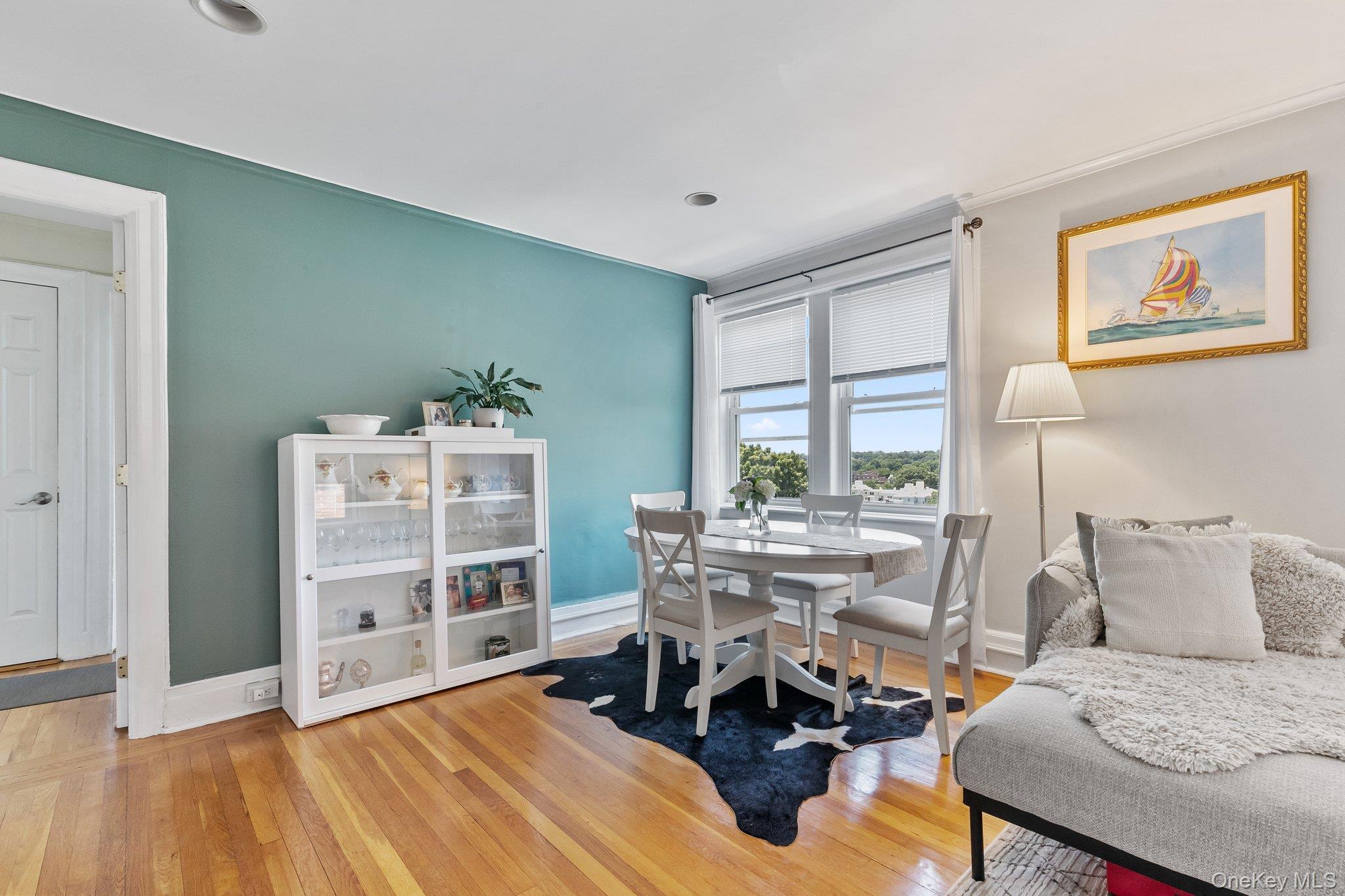 54 Sagamore Road, Unit 4E Bronxville, NY 10708 - Photo 4 of 10 a view of a livingroom with furniture and a window