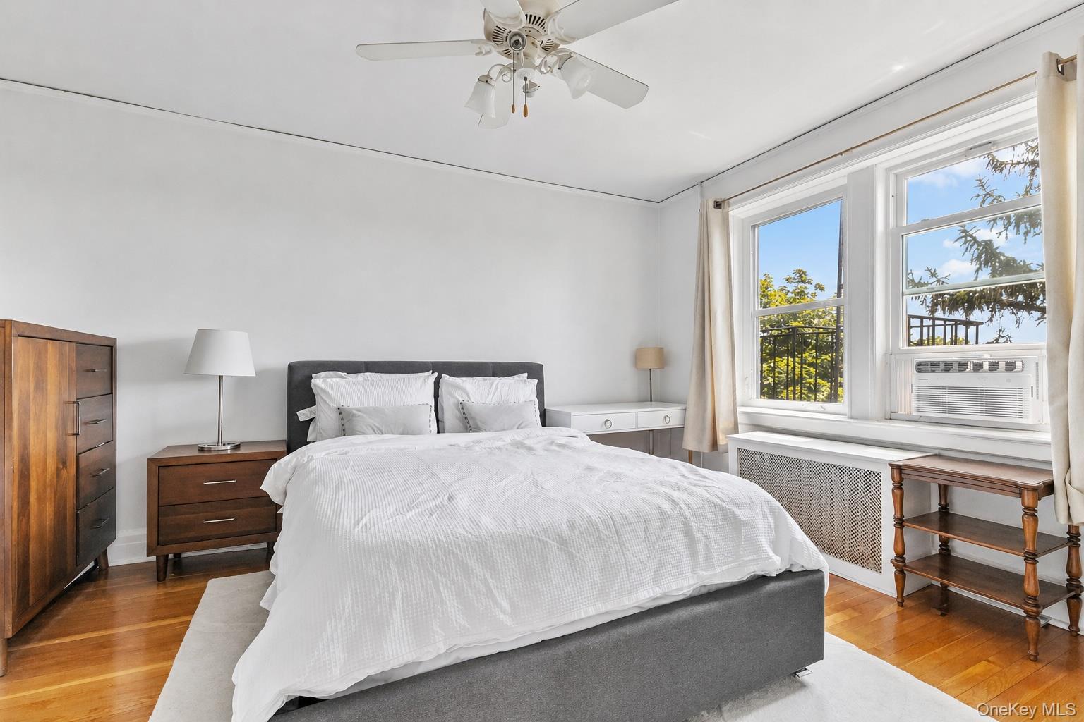 54 Sagamore Road, Unit 4E Bronxville, NY 10708 - Photo 7 of 10 a bedroom with a bed and a window