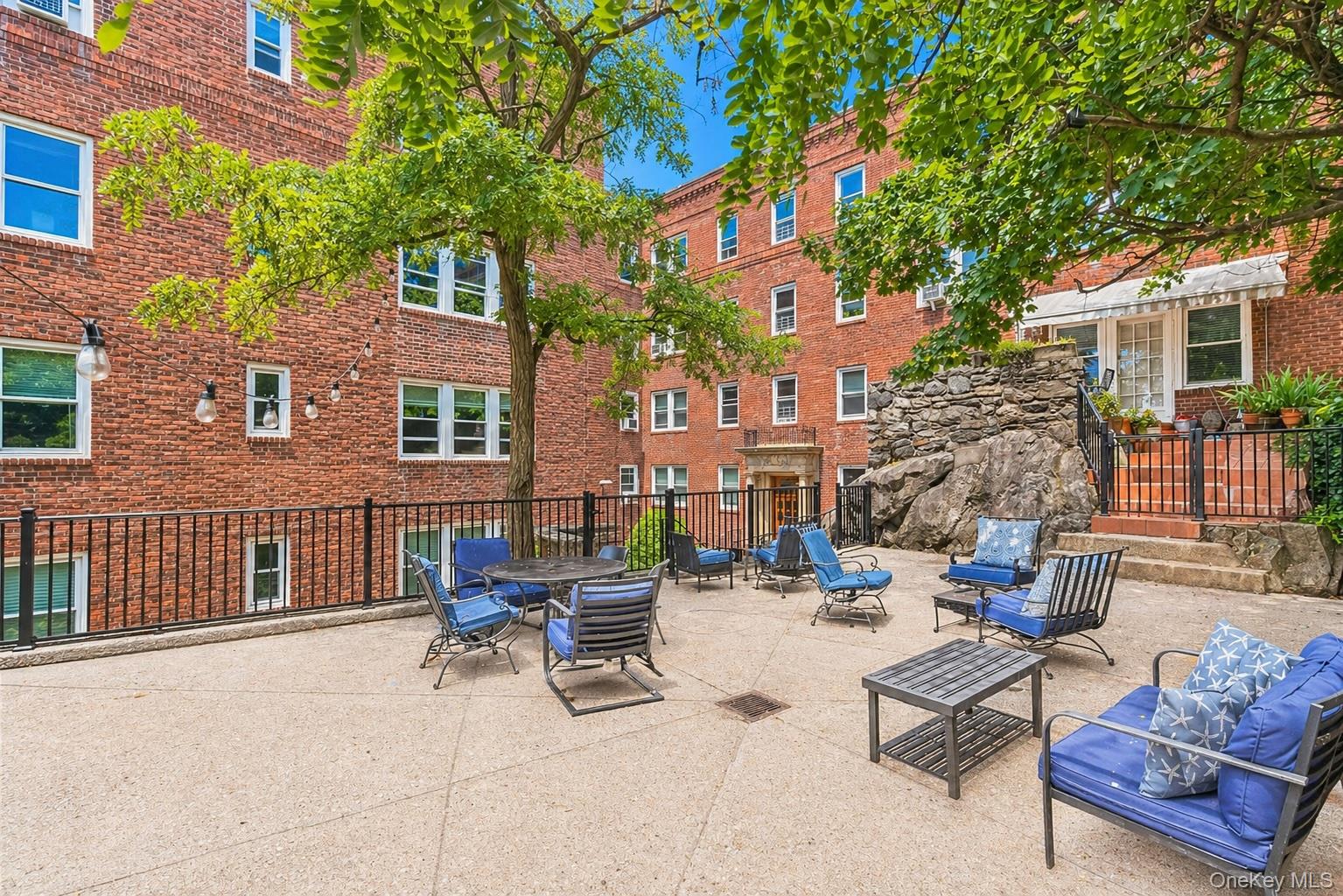 54 Sagamore Road, Unit 4E Bronxville, NY 10708 - Photo 10 of 10 a building outdoor space with patio furniture