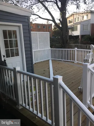 a view of a balcony with a swing