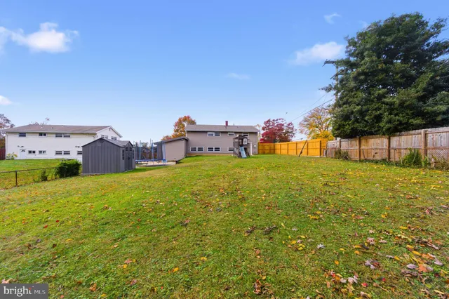 a view of a house with a big yard