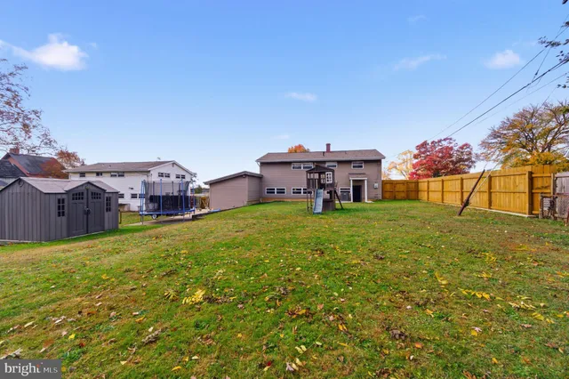 a view of a house with a big yard