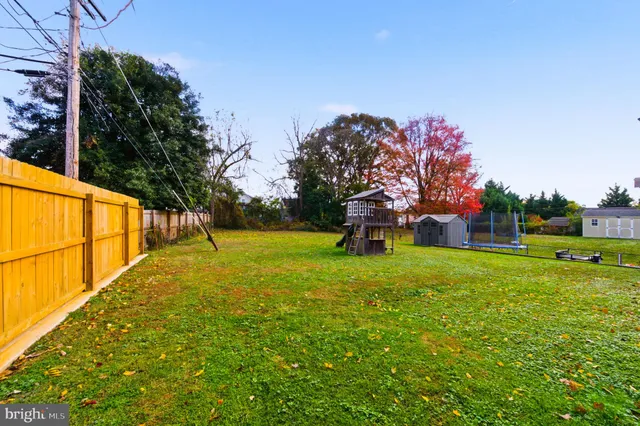 a view of backyard with outdoor space